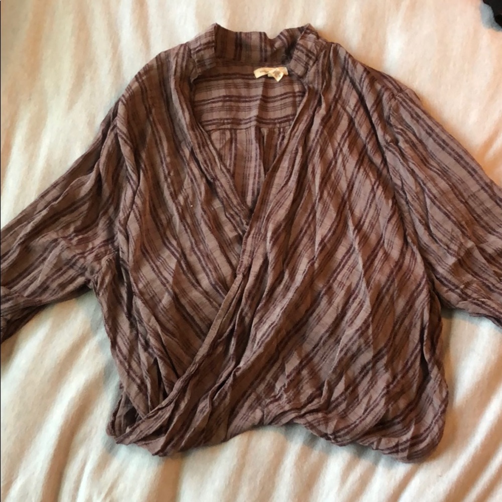 Open front mid sleeve blouse.